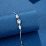 Silver Oval Bead Bracelet with CZ Centerpiece